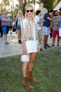 Kate Bosworth, carrying a Coach handbag and boots she designed for her Matisse shoe line, nailed festival style yet again hereby claiming the title Queen of Coachella Fashion.