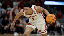 FILE - Wisconsin's Johnny Davis dribbles during the second half of a first-round NCAA college basketball tournament game against Colgate on March 18, 2022, in Milwaukee. Davis is a lottery prospect and one of the top wings in this year's NBA draft. (AP Photo/Morry Gash, File)