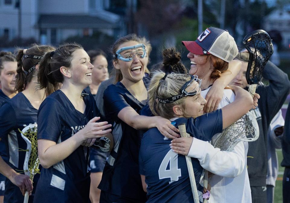 Manasquan celebrate their win over Rumson-Fair Haven. Manasquan Girls Lacrosse outlasts Rumson-Fair Haven 10-9 in Rumson on April 23, 2024.