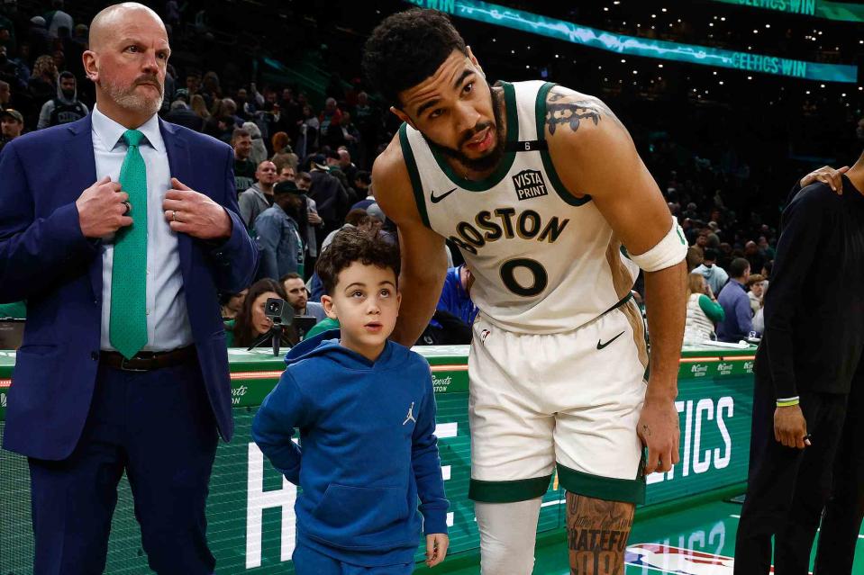 <p>Winslow Townson/Getty</p> Jayson Tatum (right) and his son Deuce at the Feb. 9, 2024 Celtics game in Boston