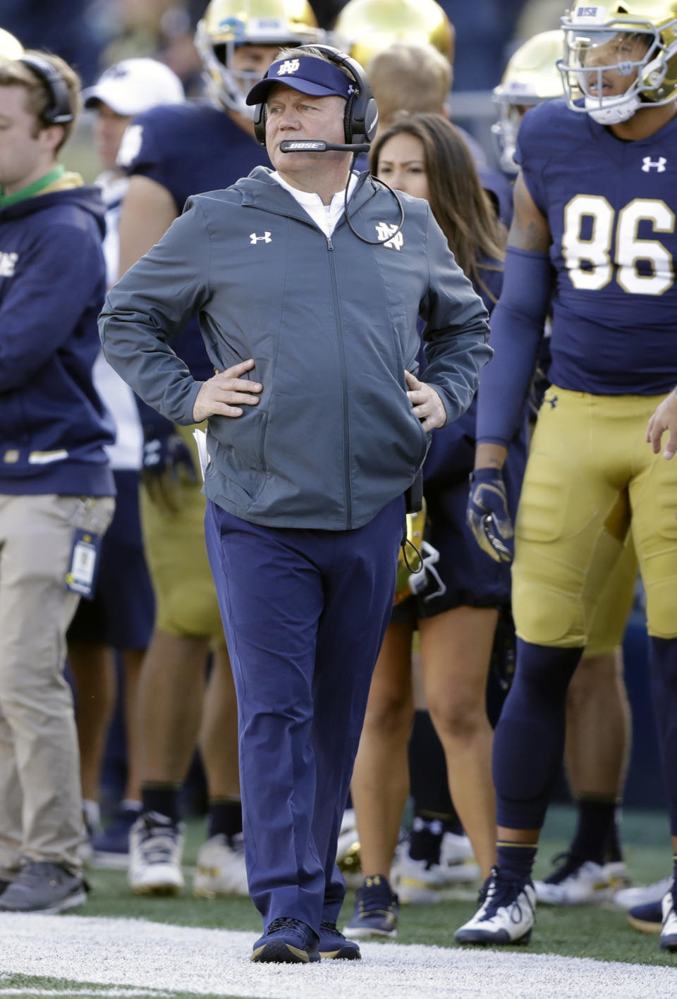 FILE - In this Oct. 13, 2018, file photo, Notre Dame head coach Brian Kelly watches during the second half of an NCAA college football game against Pittsburgh, in South Bend, Ind. Brian Kelly is The Associated Press college football Coach of the Year, Monday, Dec. 17, 2018, becoming the third coach to win the award twice since it was established in 1998. (AP Photo/Darron Cummings, File)