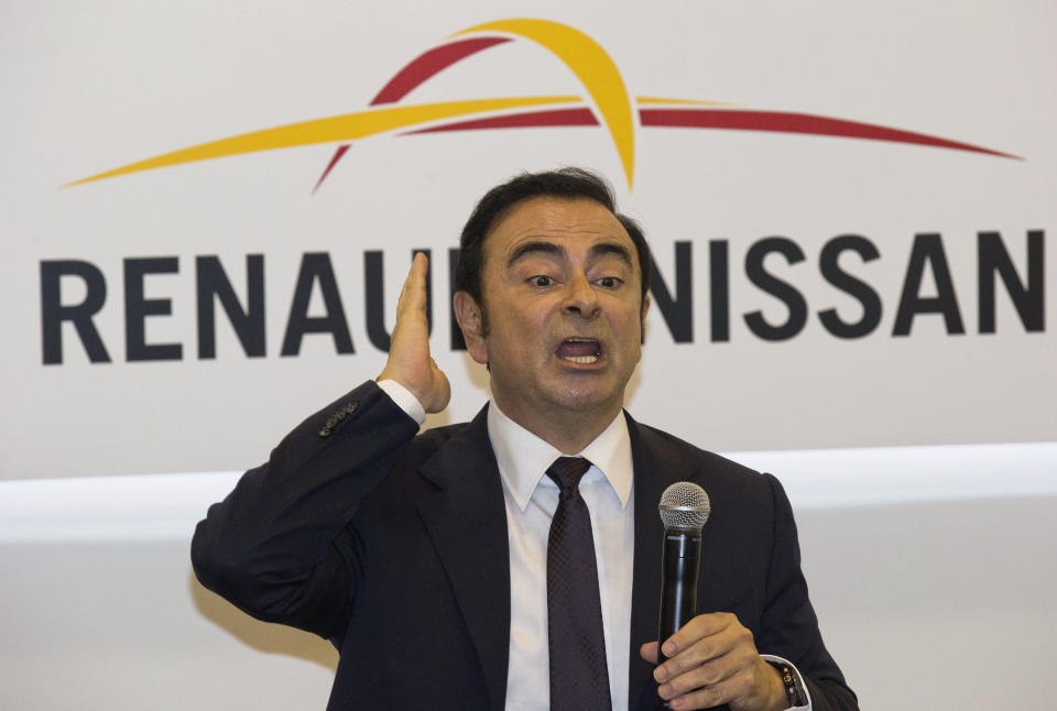 FILE - In this April 25, 2016, file photo, then Renault-Nissan's CEO Carlos Ghosn speaks during a press conference held at the Auto China 2016 in Beijing. French Finance Minister Bruno Le Maire said Thursday, Jan. 24, 2019, that Ghosn, who is fighting breach of trust and other charges in Japan, resigned as head of Renault. (AP Photo/Ng Han Guan, File)