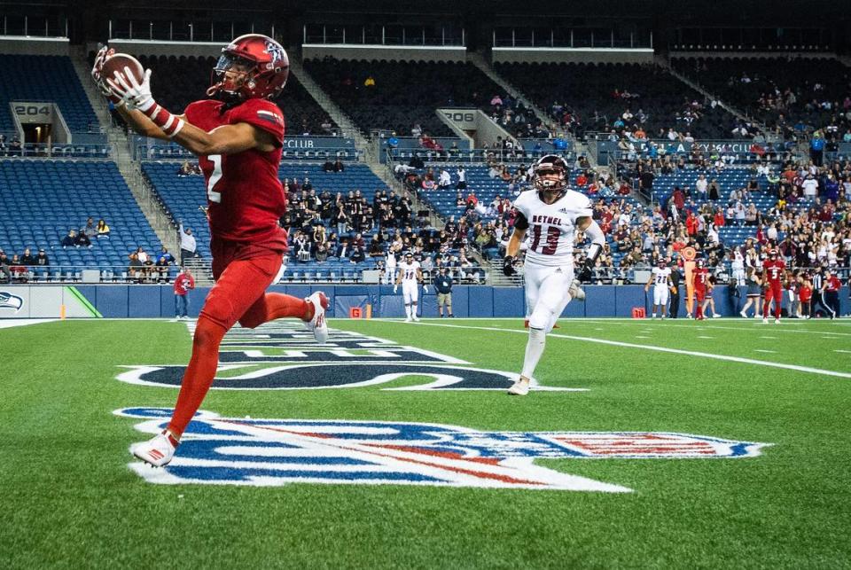 Kennedy Catholic’s Junior Alexander (2) pulls down a touchdown catch in the fourth quarter. The play was called back after a penalty. Kennedy Catholic played Bethel in a high school football game at CenturyLink Field in Seattle, Wash., on Friday, Sept. 6, 2019.