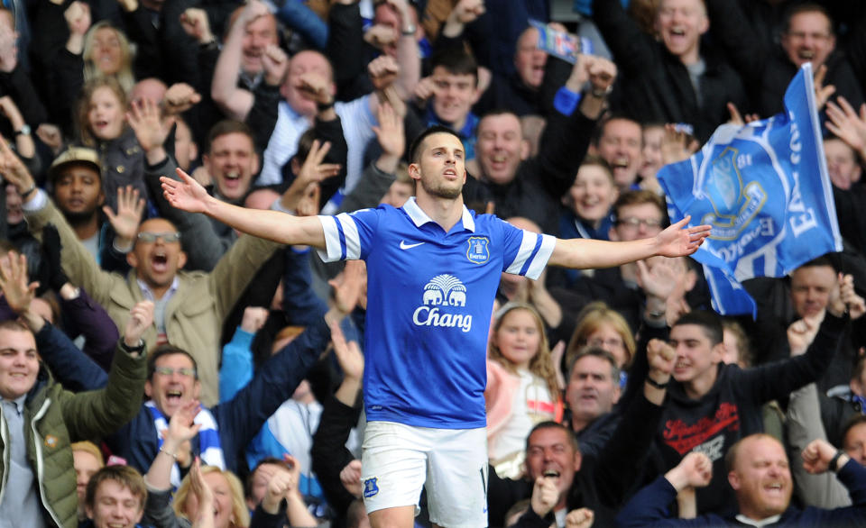 Everton's Kevin Mirallas celebrates after he scores the second goal of the game for his side during their English Premier League soccer match against Manchester United at Goodison Park in Liverpool, England, Sunday April 20, 2014. (AP Photo/Clint Hughes)