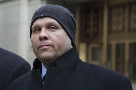 George Perez, a computer programmer for Bernard L. Madoff Investment Securities LLC, exits the Manhattan Federal Court house in New York, March 24, 2014. REUTERS/Andrew Kelly