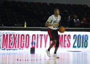 Chicago Bulls guard Kris Dunn dribbles the ball during basketball practice at the Mexico City Arena in Mexico City, Wednesday, Dec. 12, 2018. The Bulls will face Orlando Magic Thursday in the first of two 2018 regular-season NBA games to be played in the high-altitude Mexican capital. (AP Photo/Rebecca Blackwell)