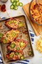 <p>These twice-baked potatoes are loaded with the makings of a full chicken dinner.</p><p>Get the <a href="https://www.delish.com/uk/cooking/recipes/a32399949/barbecue-chicken-sweet-potatoes-recipe/" rel="nofollow noopener" target="_blank" data-ylk="slk:BBQ Chicken Twice-Baked Potatoes;elm:context_link;itc:0;sec:content-canvas" class="link ">BBQ Chicken Twice-Baked Potatoes</a> recipe.</p>