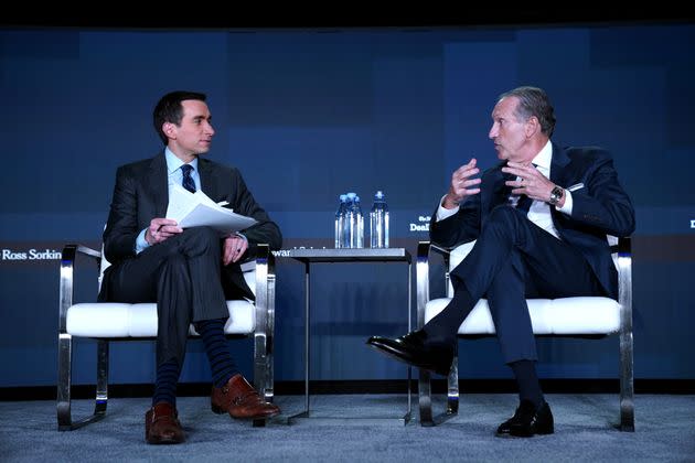 Andrew Ross Sorkin and Howard Schultz speak on stage at the New York Times DealBook/DC policy forum on June 9 in Washington, D.C. (Photo: Leigh Vogel via Getty Images)
