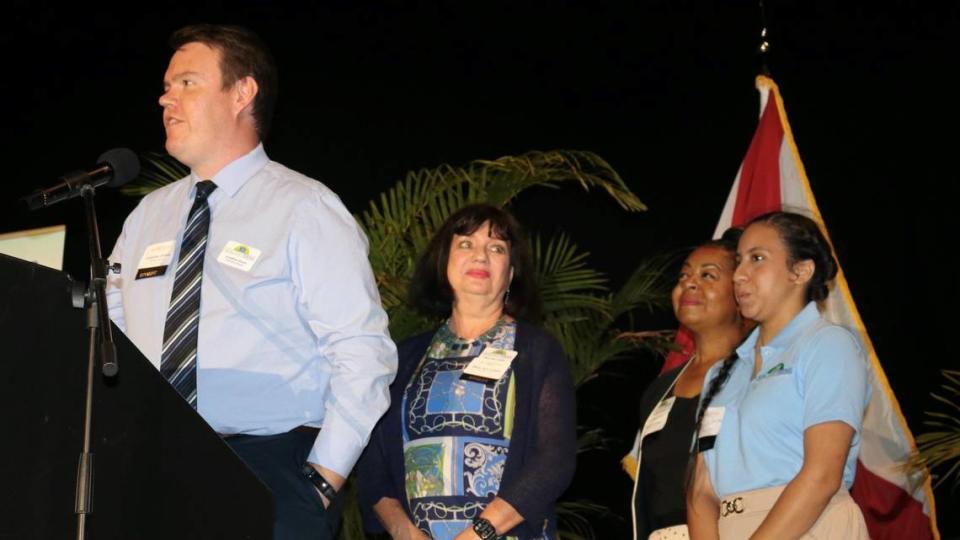 Healthy Teens won the Category I nonprofit of the year award from the Manatee Chamber of Commerce 6/29/2023. Accepting the award was executive director Jonathan Evans and founder Mary Ann Legler, second from left.