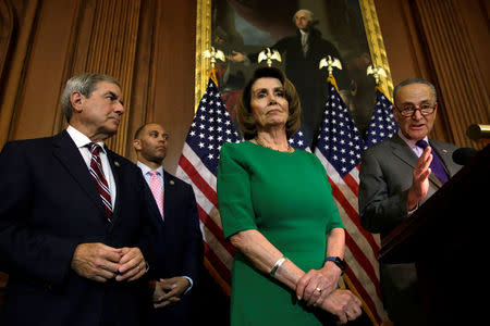 U.S. Senate Minority Leader Chuck Schumer (D-NY) (R) speaks next to House Minority Leader Nancy Pelosi (D-CA) during a news conference on President Trump's first 100 days on Capitol Hill in Washington, U.S April 28, 2017. REUTERS/Yuri Gripas