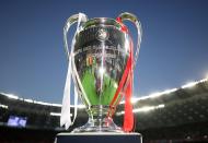 <p>The Champions League Trophy on display prior to the 2018 final at the NSK Olimplyskiy Stadium in Kiev </p>