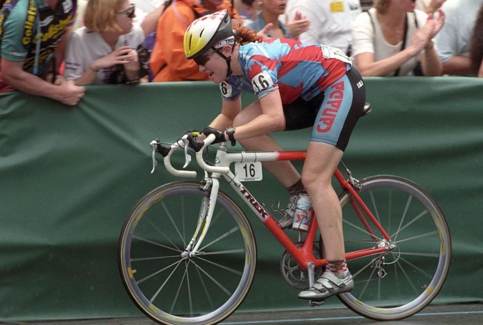 Hughes rides her bike