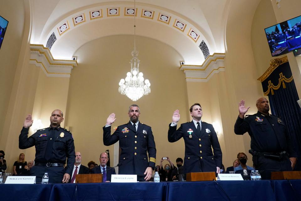 In this file photo, (L-R) US Capitol Police Sergeant Aquilino Gonell, DC Metropolitan Police Department Officer Michael Fanone, DC Metropolitan Police Department Officer Daniel Hodges and US Capitol Police Private First Class Harry Dunn, are sworn in before members of the Select Committee, as they investigate the January 6, 2021, attack on the US Capitol, during their first hearing on Capitol Hill in Washington, DC, on July 27, 2021.