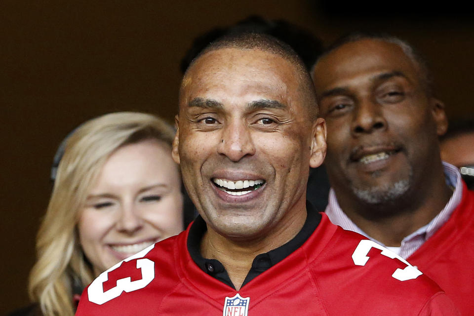 FILE - Former San Francisco 49ers running back Roger Craig smiles during halftime of an NFL football game between the San Francisco 49ers and the Cincinnati Bengals in Santa Clara, Calif., Sunday, Dec. 20, 2015. Versatile running back Roger Craig, and two-time Super Bowl-winning coaches Tom Coughlin and Mike Shanahan advanced to the next stage of consideration for the Pro Football Hall of Fame. The selection committees cut down the list of candidates from 31 seniors and 29 coaches and contributors to 12 in each category in results announced Thursday, July 27, 2023.(AP Photo/Tony Avelar, File)