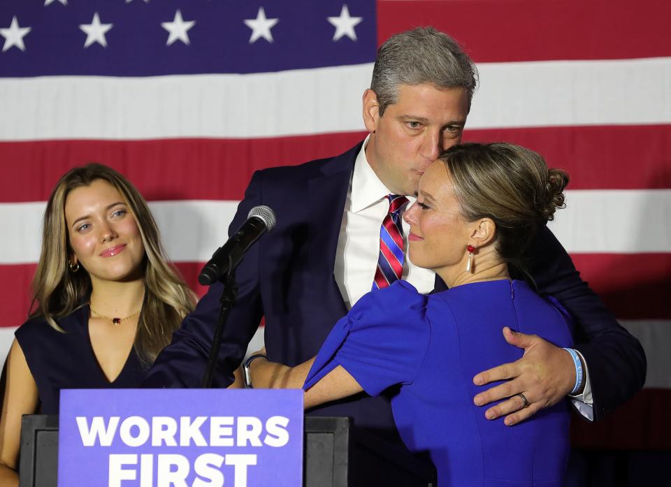 Democratic U.S. Senate candidate Tim Ryan embraces his wife Andrea after the race was called for Republican J.D. Vance during an election night gathering at Mr. Anthony’s Banquet Center in Boardman.