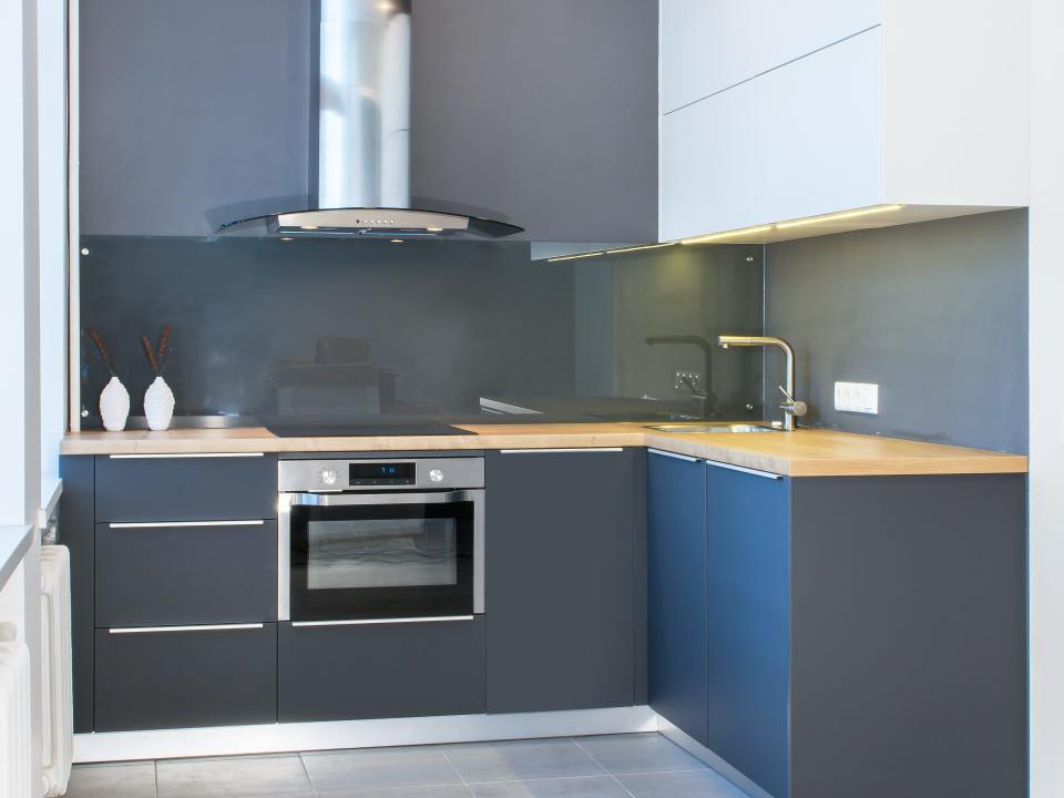 Kitchen with graphite-colored cabinets and counters