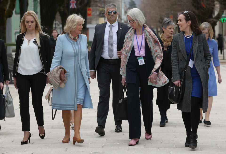 CETINJE, MONTENEGRO - MARCH 18:  Camilla, Duchess of Cornwall, walks in the town center with her current biographer Penny Junor (2nd from R) and Express reporter Camilla Tominey (R) on March 17, 2016 in Cetinje, Montenegro. The Prince and Duchess are visiting Croatia, Serbia, Montenegro and Kosovo.  (Photo by Sean Gallup/Getty Images)