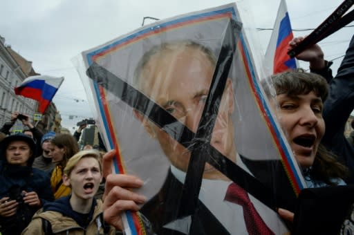 Opposition supporters attended an unauthorized anti-Putin rally called by opposition leader Alexei Navalny on May 5 in Saint Petersburg, two days ahead of Vladimir Putin's inauguration for a fourth Kremlin term
