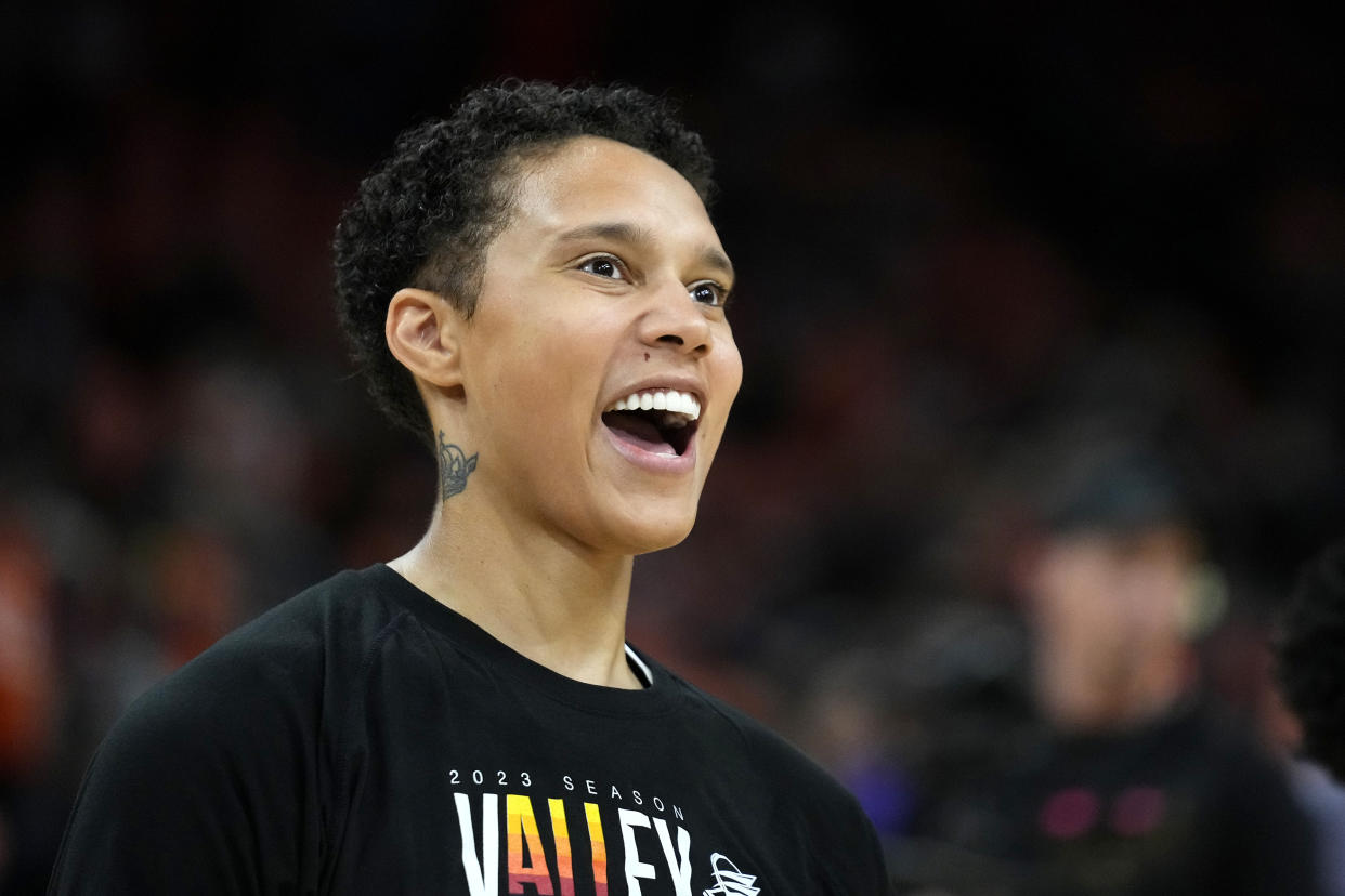Phoenix Mercury center Brittney Griner smiles as she warms up prior to a WNBA basketball game against the Chicago Sky Sunday, May 21, 2023, in Phoenix. (AP Photo/Ross D. Franklin)