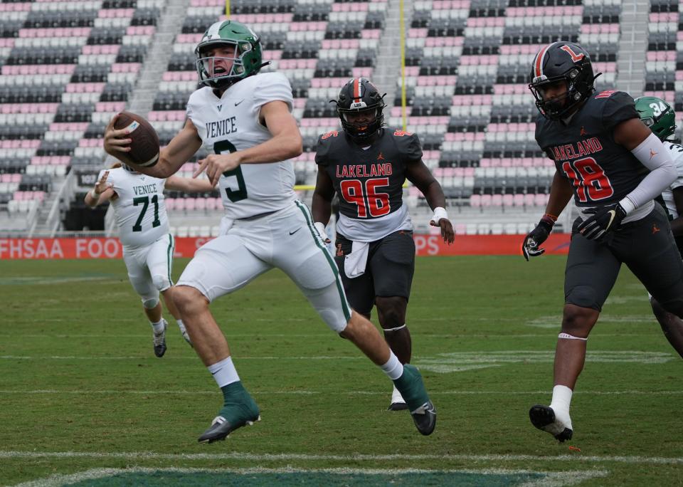 Quarterback Brooks Bentley (9) of Venice scores a touchdown in the first quarter against Lakeland during the Class 4S state championship game at DRV PNK Stadium, Saturday, Dec. 17, 2022 in Fort Lauderdale. 