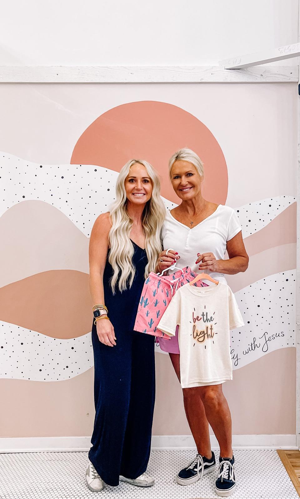 Allyson Halsey and her mother, Karen Graham, launched Sunny Side Clothing Co. to provide affordable, easy to wear clothes for children. Pictured at Reap the Sew boutique in Halls on June 9, 2022.