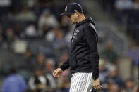 New York Yankees manager Aaron Boone walks back to the dugout after a pitching change during the seventh inning against the Toronto Blue Jays in a baseball game Thursday, Sept. 9, 2021, in New York. (AP Photo/Adam Hunger)