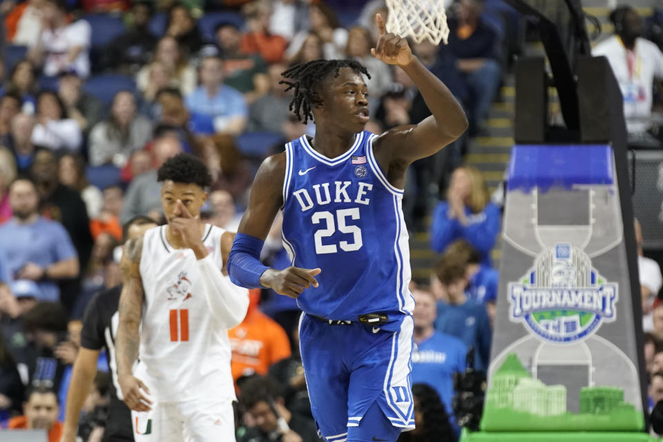 Duke forward Mark Mitchell (25) celebrates late in the second half of an NCAA collegiate basketball game against Miami at the Atlantic Coast Conference Tournament in Greensboro, NC, Friday March 10, 2023. (AP Photo/Chuck Burton)