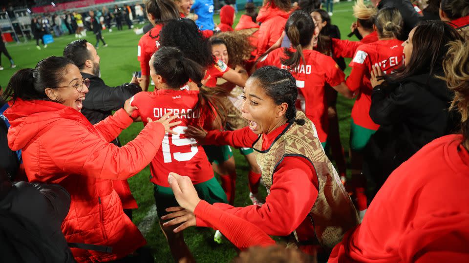 Morocco players celebrate reaching the last 16 of the Women's World Cup. - Alex Grimm/FIFA/Getty Images