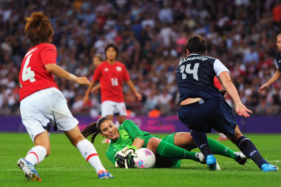 LONDON, ENGLAND - AUGUST 09: Hope Solo #1 of the United States makes a save against Japan during the Women's Football gold medal match on Day 13 of the London 2012 Olympic Games at Wembley Stadium on August 9, 2012 in London, England. (Photo by Michael Regan/Getty Images)