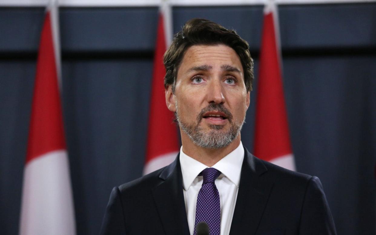 Justin Trudeau said the rollover would be the basis for a new UK-Canada free trade agreement - AFP