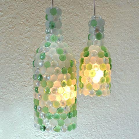 Pendant lamps cast a pretty glow over any entertaining spread. Mix and match the glass pebbles to complement your decor.
Get the tutorial here.