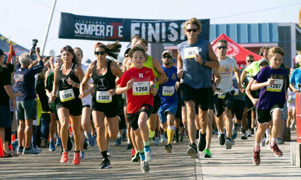 Start of the Semper Five 5K race.  Three years after its cancellation due to a terrorist bombing, the sixth annual Seaside Semper Five Marine Corps Charity 5K Run/Walk returned to the Jersey Shore. this Saturday. This yearâ€™s race once again, attracted thousands of participants, all taking part in a massive effort to once again show the spirit and determination of race community sending a strong message that they will not be deterred by terrorism. 