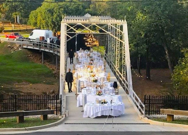 Before the celebration began on Oct. 4, tables were set in place on the recently improved bridge in Oconee Hill Cemetery.