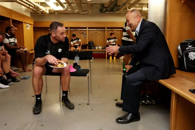 Mark Jones speaks to Eddie Jones after the Barbarians' match against Wales -Credit:Getty Images