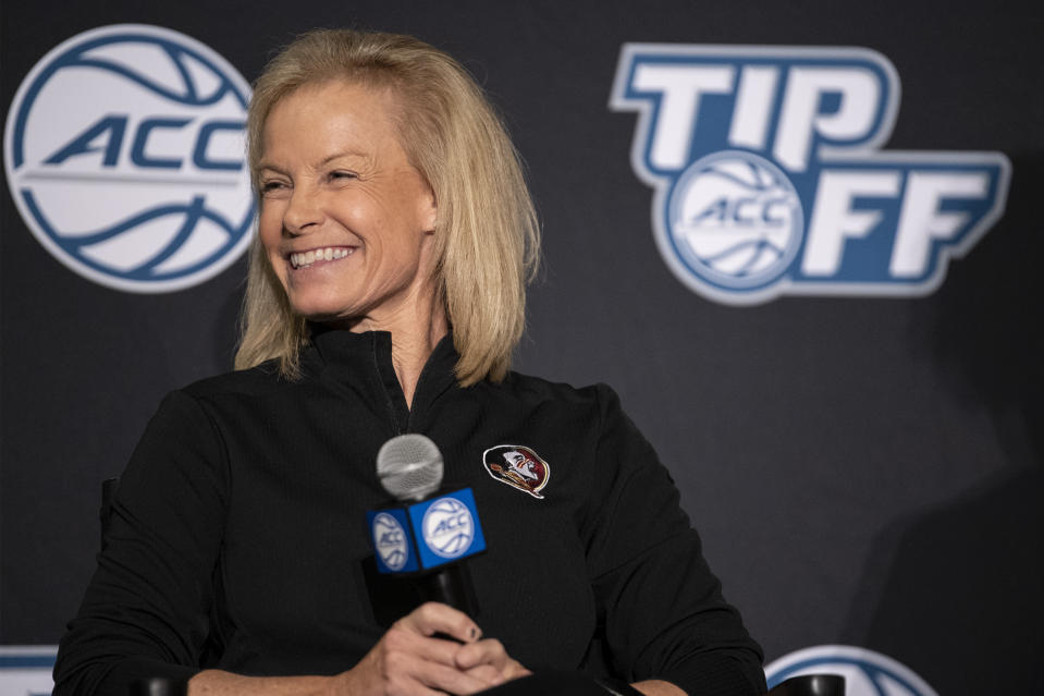 Florida State head coach Sue Semrau smiles during NCAA college basketball Atlantic Coast Conference media day, Wednesday, Oct. 13, 2021, in Charlotte, N.C. (AP Photo/Matt Kelley)