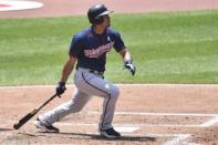 Jun 17, 2018; Cleveland, OH, USA; Minnesota Twins third baseman Eduardo Escobar (5) hits a double in the third inning against the Cleveland Indians at Progressive Field. Mandatory Credit: David Richard-USA TODAY Sports