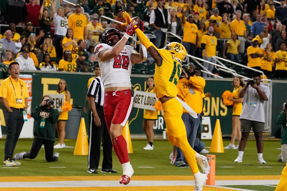 Texas Tech tight end Baylor Cupp (88) makes a touchdown catch against Baylor cornerback Caden Jenkins (19) during the Big 12 football game, Saturday, Oct. 7, 2023, at McLane Stadium in Waco, Texas.