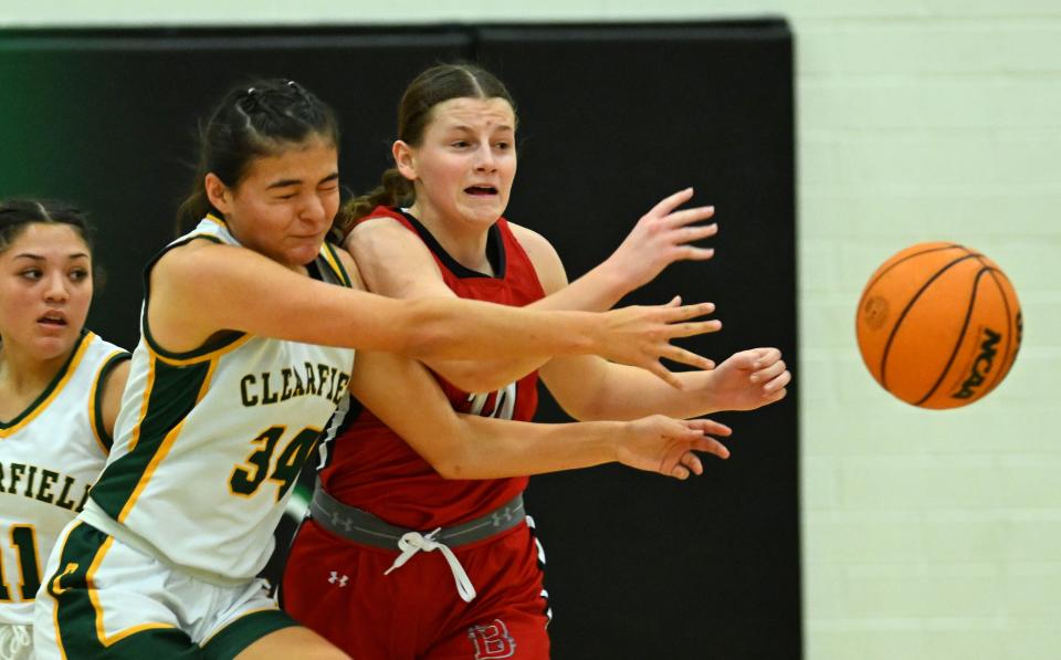 Clearfield’s Julia Smith crashes into Bountiful’s Isabeau Hoff as they play at Clearfield on Wednesday, Jan. 17, 2024. Bountiful won 56-47. | Scott G Winterton, Deseret News