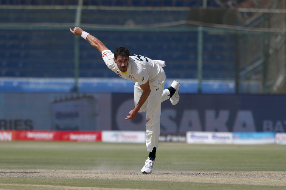 Australia's Mitchell Starc bowls on the third day of the second test match between Pakistan and Australia at the National Stadium in Karachi, Pakistan, Monday, March 14, 2022. (AP Photo/Anjum Naveed)