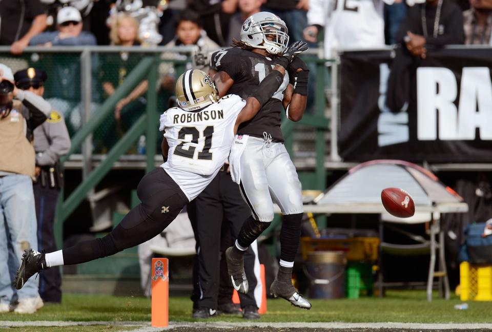 OAKLAND, CA - NOVEMBER 18: Patrick Robinson #21 of the New Orleans Saints gets called for pass interference in the endzone on Denarius Moore #17 of the Oakland Raiders during the second quarter of their NFL football game at O.co Coliseum on November 18, 2012 in Oakland, California. (Photo by Thearon W. Henderson/Getty Images)