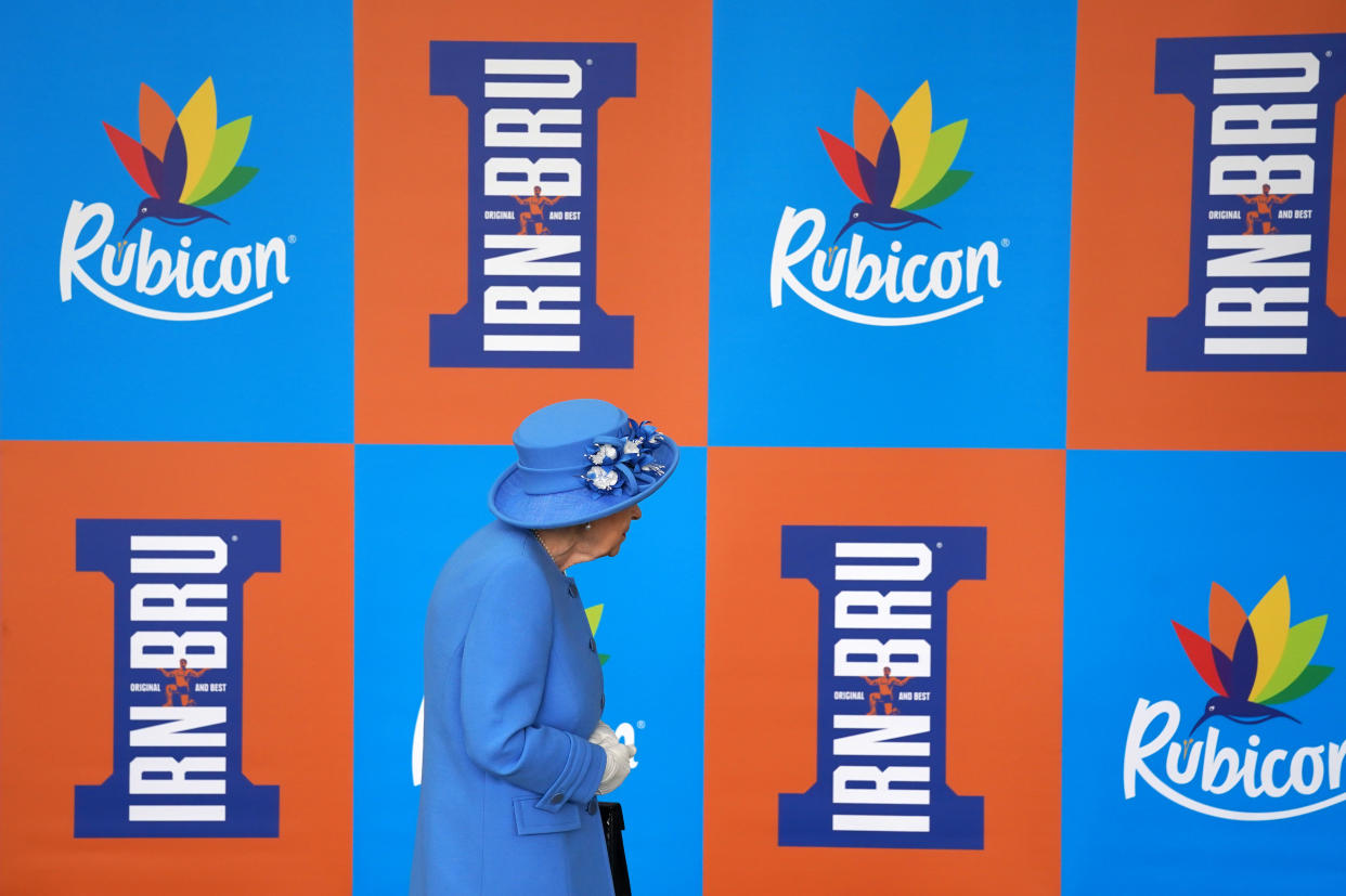 Queen Elizabeth II during a visit to AG Barr's factory in Cumbernauld, where the Irn-Bru drink is manufactured, as part of her traditional trip to Scotland for Holyrood Week. Picture date: Monday June 28, 2021.