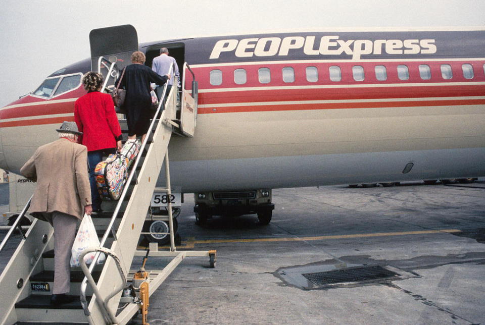 People boarding a plane