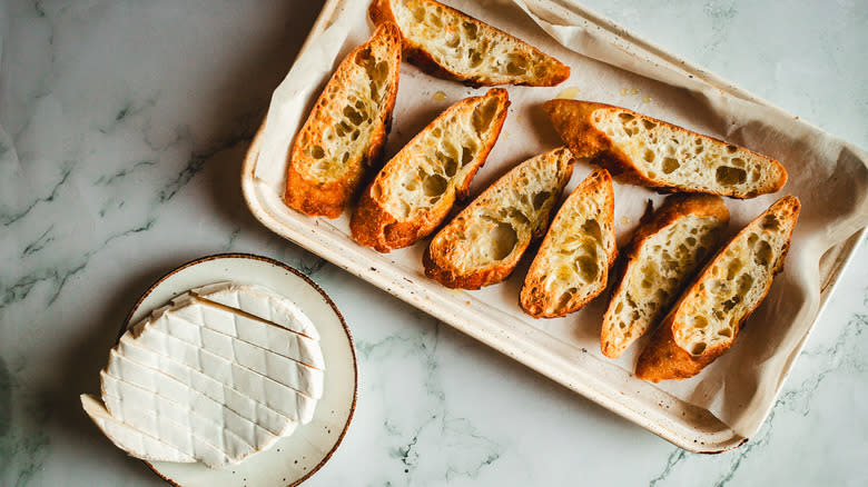 Baguette slices and brie