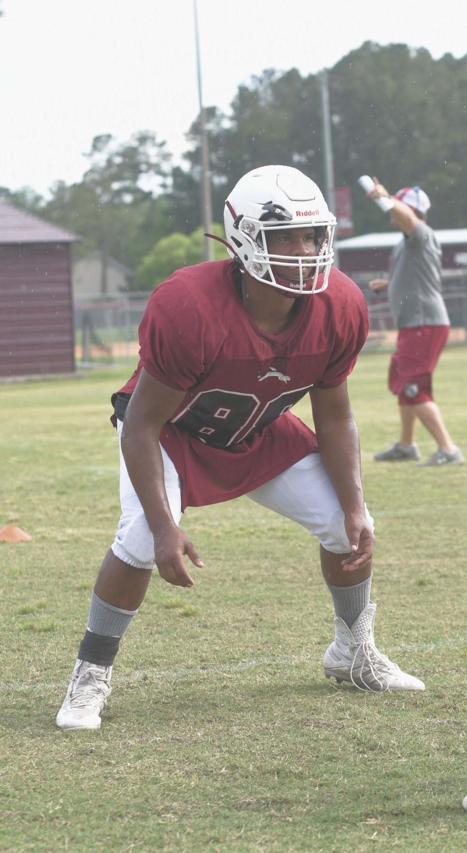 South Effingham High School freshman Kadin Ward (88) faces a teammae during drills at spring practice.