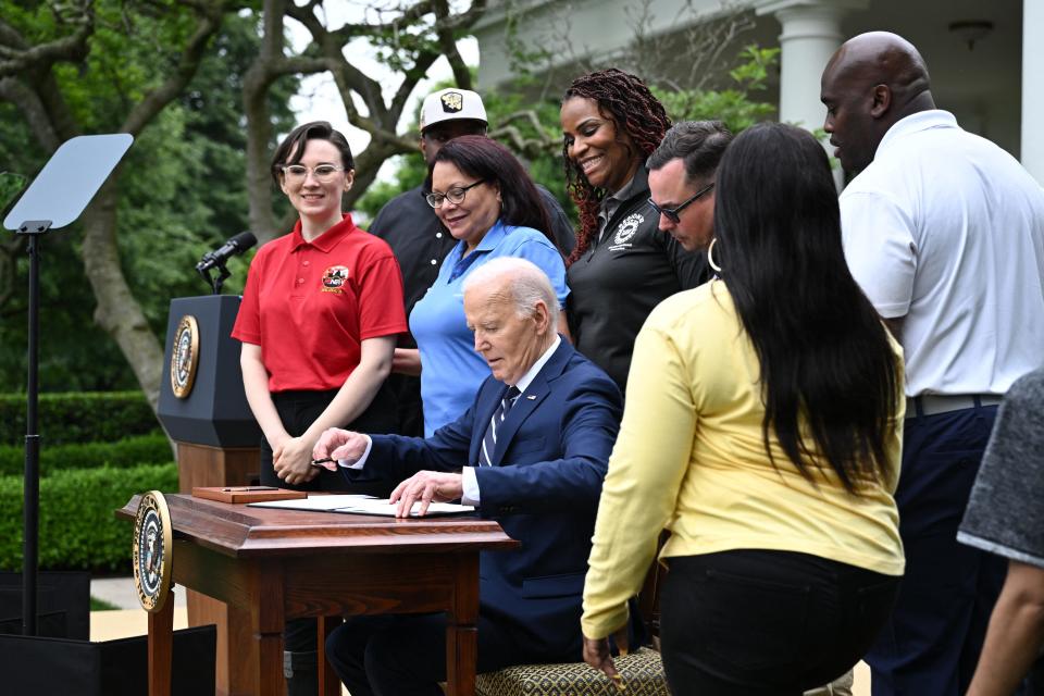 President Joe Biden signs documents that increase tariffs on China, after speaking about new actions to protect American workers and businesses from China's unfair trade practices in the Rose Garden of the White House in Washington, DC, on May 14, 2024.