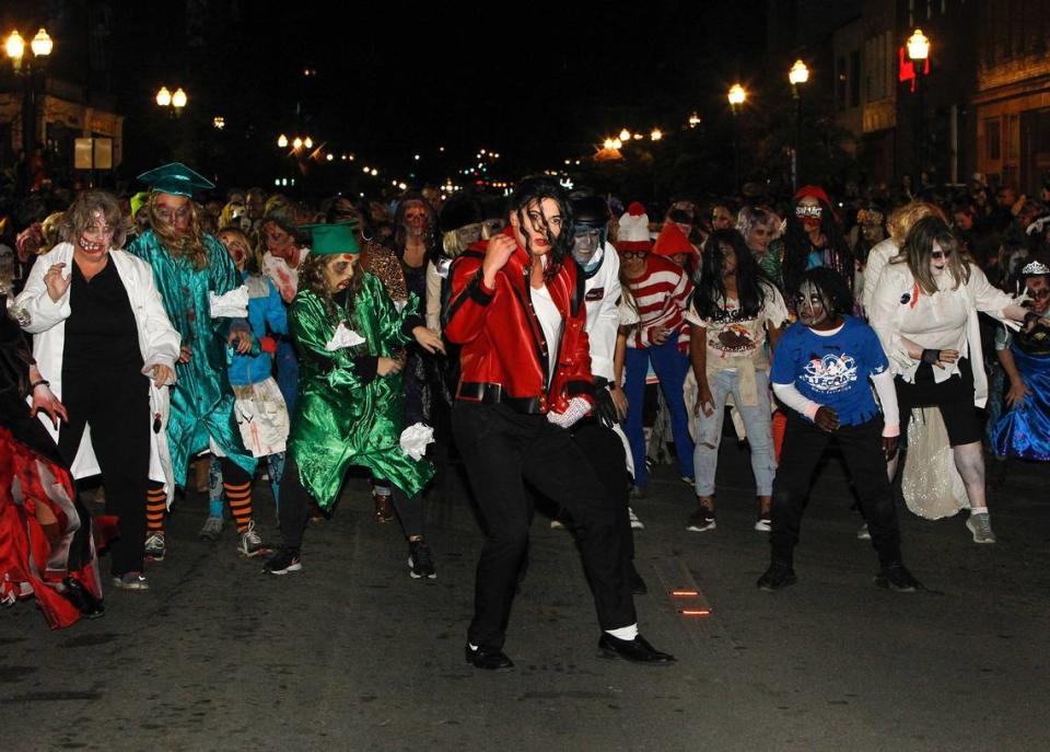 Hundreds of people participate in Lexington’s annual “Thriller” dance, parade and other Halloween events downtown.
