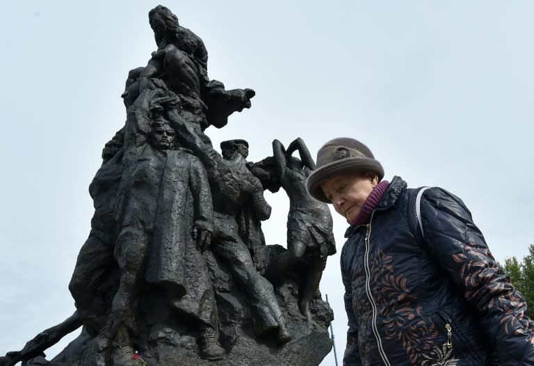 Survivor Raisa Maistrenko visits the Babi Yar monument in Kiev on September 23, 2016 as Ukraine prepares to marks the 75th anniversary of the September 1941 mass execution of Jews at Babi Yar