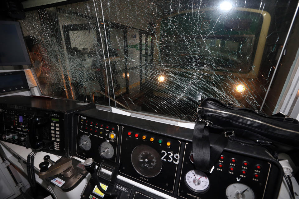 A window of a subway train is broken after a collision at Sangwangshipri subway station in Seoul, South Korea, Friday, May. 2, 2014. (AP Photo/Yonhap, Park Dong-ju)