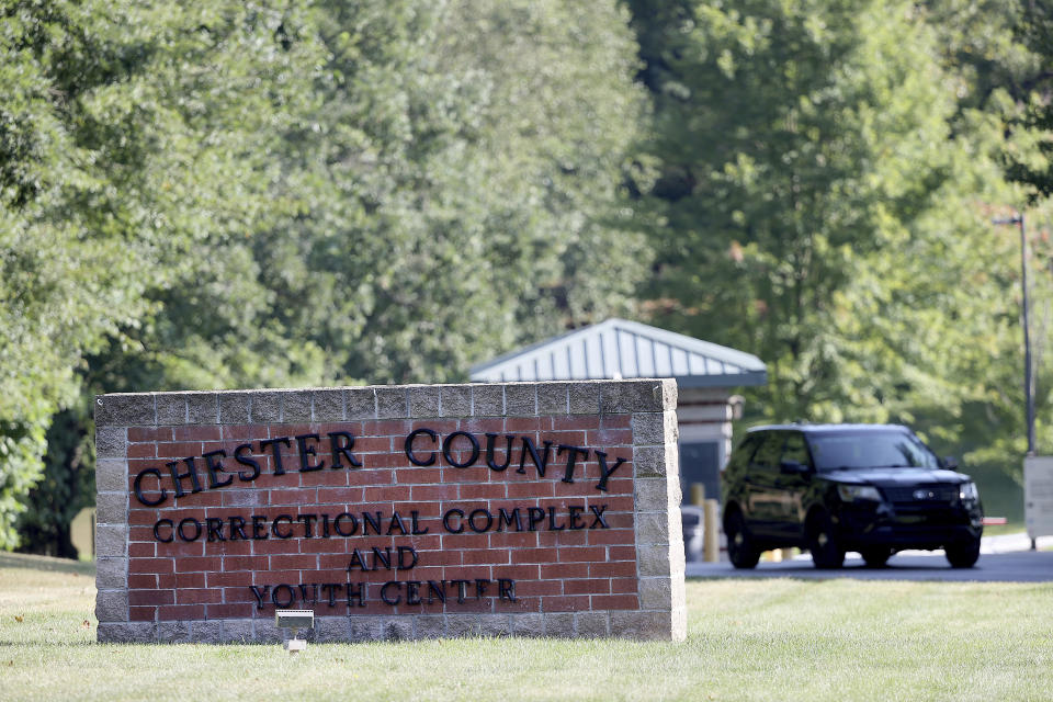 A vehicle leaves the Chester County Correctional Complex as the search continues for Danilo Cavalcante in Pocopson Township, Pa., on Sept. 3, 2023. According to an email exchange hours after the Aug. 31 escape of a convicted murderer from the Chester County jail, a prison guard had warned in July that Cavalcante was a flight risk. Cavalcante remained free for two weeks amid a massive manhunt before his recapture last month. Cavalcante, also wanted in a 2017 slaying in Brazil, had been sentenced to life in prison in the death of his ex-girlfriend and was awaiting transfer to state prison when he fled. (David Maialetti/The Philadelphia Inquirer via AP)