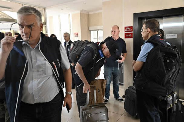 PHOTO: Members of an International Atomic Energy Agency (IAEA) inspection mission enter a hotel after their arrival in Zaporizhzhia, Ukraine, Aug. 31, 2022.  (Genya Savilov/AFP via Getty Images)